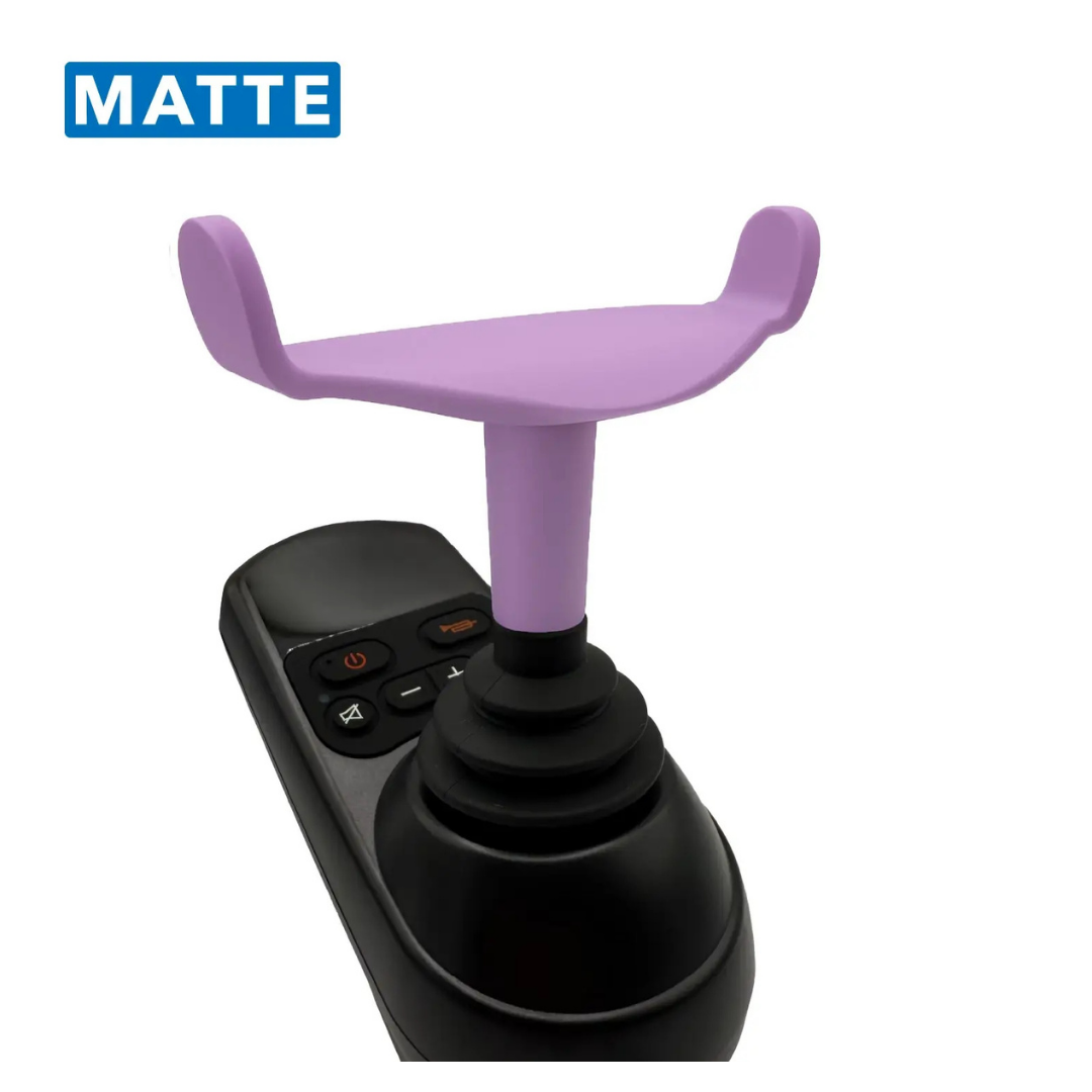 The ComfyGo Ergonomic U-Shaped Joystick Handle with Flex Shaft for Powerchairs, shown with a purple matte finish and attached to a black wheelchair joystick base with multiple control buttons, appears against a white background.